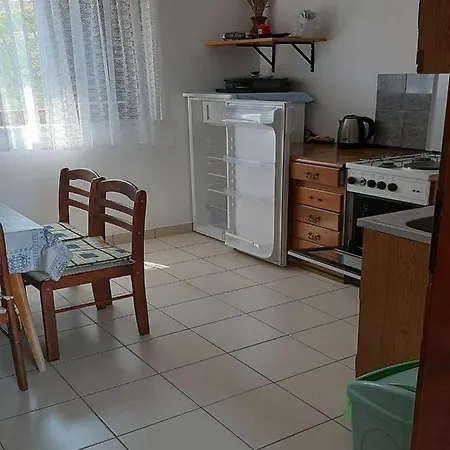 Apartmán By The